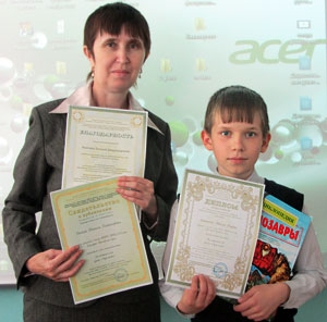 Литвиненко Максим, победитель конференции, вместе со своим педагогом